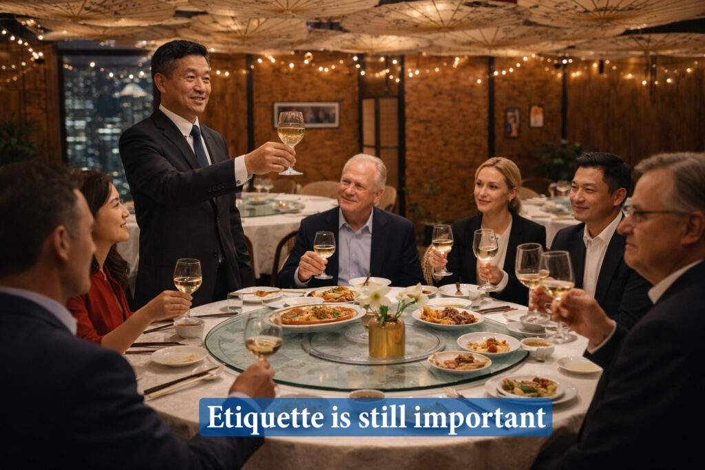 Chinese executive giving a toast at business dinners in China, with Chinese and Western professionals seated around a formal round table.
